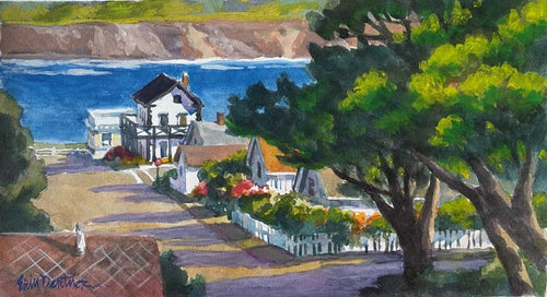 View down Kasten Street, Mendocino, to the bay, looking past gardens and Highlight Gallery