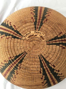 Signature on bottom of turned and scored wood bowl, hand painted inside and out with an authentic black and red Yokut design, (from the Four Corners area) This looks like a woven Native American basket, but is not.