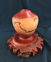 Load image into Gallery viewer,  This unique turned vase has a fractal burned design over the light sapwood and a natural edge base, all of one piece. The design shows the bark and layers of inner bark, cambium and sapwood. 
