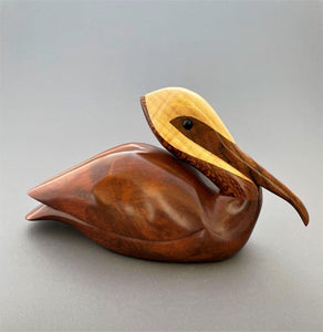 Pelican sculpture of redwood burl, lacewood, maple and walnut
