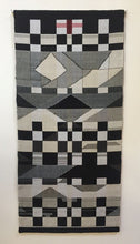 Load image into Gallery viewer, Double woven wall hanging in black and cream, with a touch of red.
