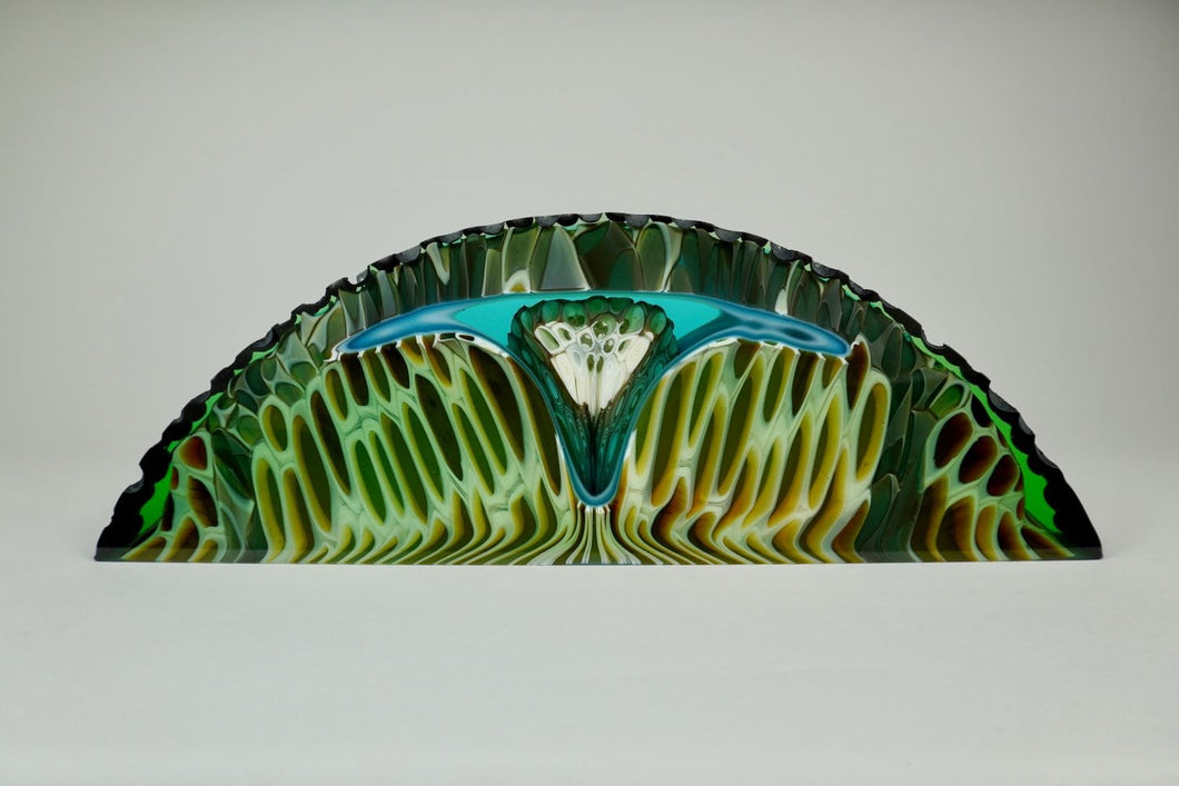  Olive green, teal, gold, sage, white, grey and cornflower blue colors run through an arched shaped piece. The top arched edge is textured with smooth, flat sides and bottom. Its beauty is enhanced even more as light shines through it.