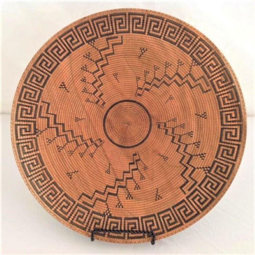 large turned wood platter, painstakingly scored and hand painted with authentic Hopi-inspired design inscribed on both front and back. It looks like an antique basket, but it is not.