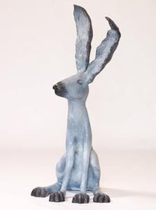 Cast bronze rabbit, whimsical, blue-gray patina deepens to black at his feet, nose tip and the edges of his ears.