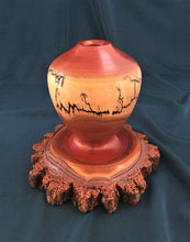 Load image into Gallery viewer, This unique turned vase has a fractal burned design over the light sapwood and a natural edge base, all of one piece.The design shows the bark and layers of inner bark, cambium and sapwood. 
