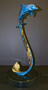cobalt patina on bronze with bright bronze highlights on wave, dolphin and baby