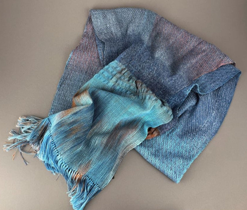 handwoven shawl in wool, silk and tencel in shades of sky and earth
