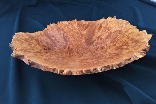 natural edge turned open vessel of maple burl