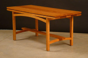 Finelines coffee table with arched detail under table top, cherry wood