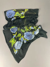 Load image into Gallery viewer, Soft blue-purple roses with fresh green leaves hand-painted on black silk scarf/wrap
