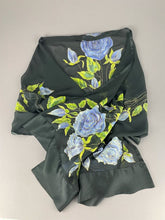 Load image into Gallery viewer, Soft blue-purple roses with fresh green leaves hand-painted on black silk scarf/wrap
