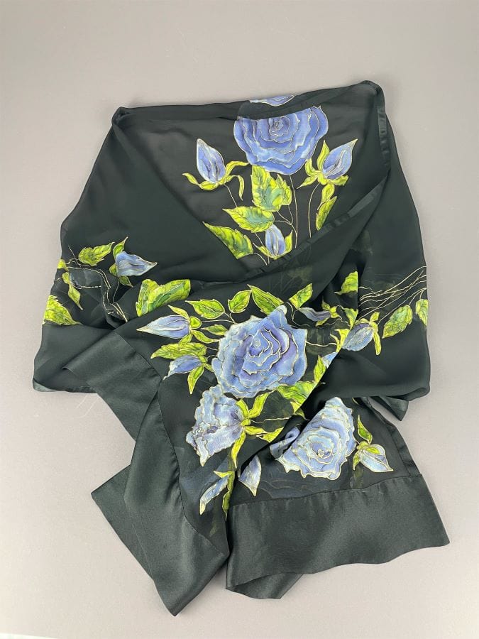 Soft blue-purple roses with fresh green leaves hand-painted on black silk scarf/wrap
