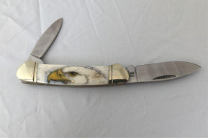 Bald Eagle Knife, scrimshaw on bone - The Highlight Gallery